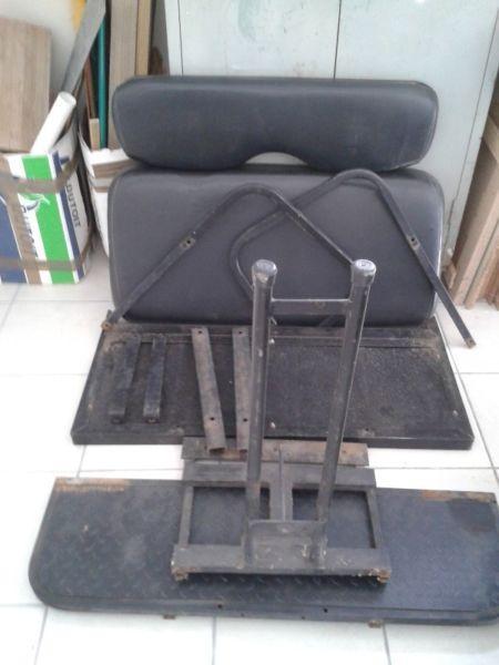 Rear seat and hardware for a golf cart