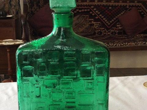 Green bottle with lid