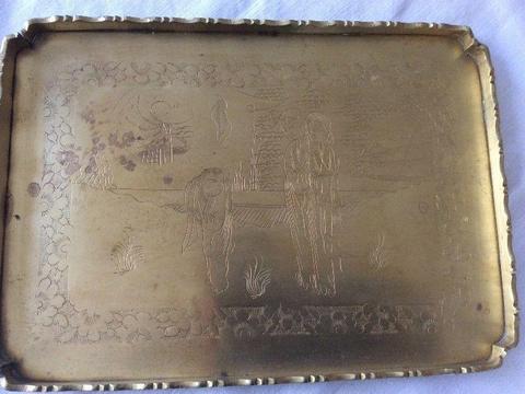 Old brass tray with Eastern image