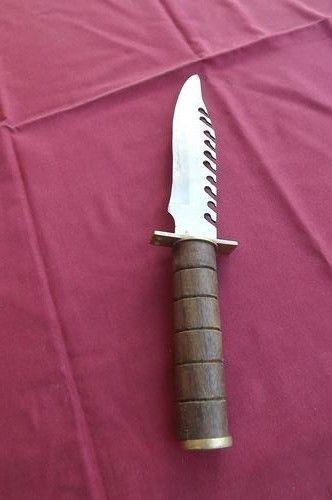 Serrated blade knife.Can take apart.Made from steel,brass and with wooden handle 28cm long