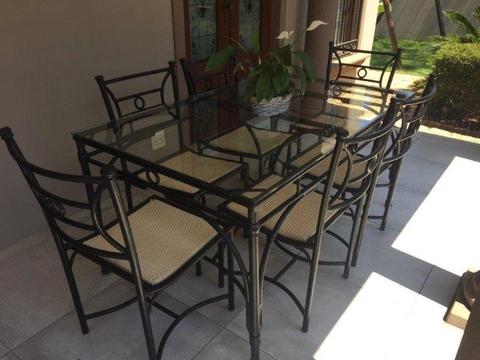 PATIO SET. STEEL/ALUMINIUM FRAME TABLE WITH 10mm SAFETY GLASS TOP & 6 x RATTAN CHAIRS