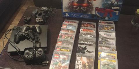 PS3 for sale with 20 games! Bundle deal with accessories!