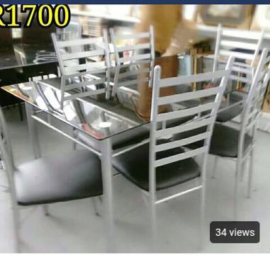 Brand new glass table sets in boxes