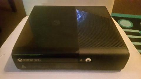 Xbox 360 with 2 controllers and 4 games