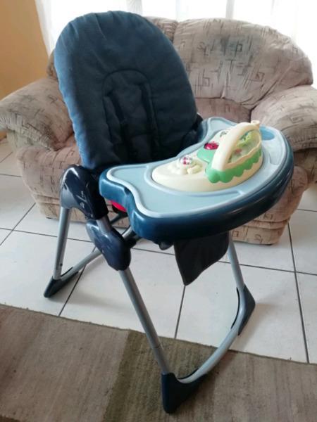 Musical adjustable feeding/play chair