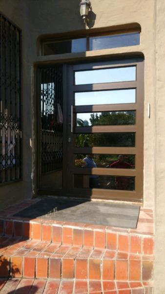 Aluminium doors, windows, Alu gates and timber gates, Stack Doors, Patio Enclosures