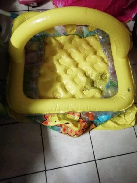 Blow up play pen