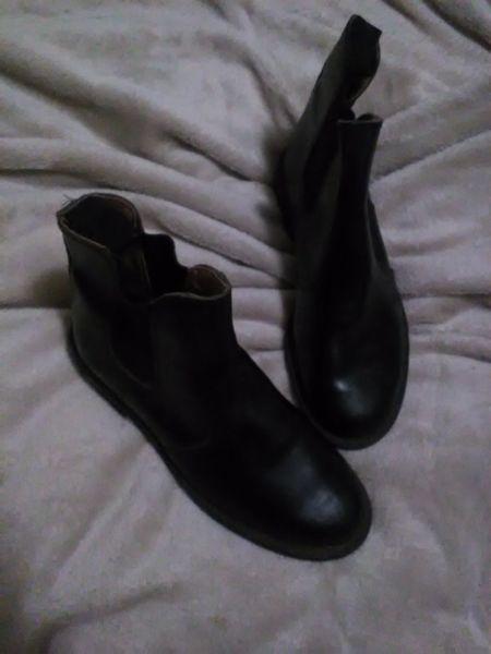 Almost new horse riding boots and hard riding cap for sale
