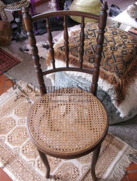Chair wooden with round rattan seat vintage