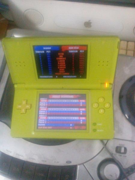 Nintendo DS Lite + Charger & Game R450