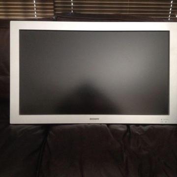 Sony flat wide display monitor with wall bracket