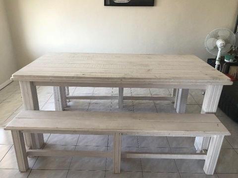 Rustic pine picnic-style dining table and benches