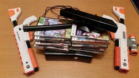 250 GB Xbox 360 with 2 controllers, 2 Top Shot Elite guns(with sensor), Kinect Sensor and 38 games