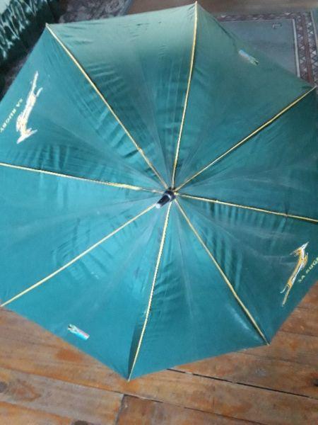 Two very large rain umbrella