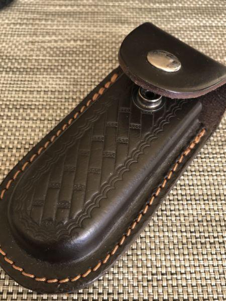 Leather pouch for pocket knife
