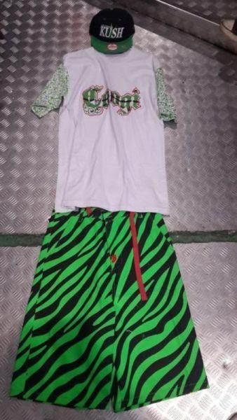 trukfit shorts and coogi tshirt and kush cap