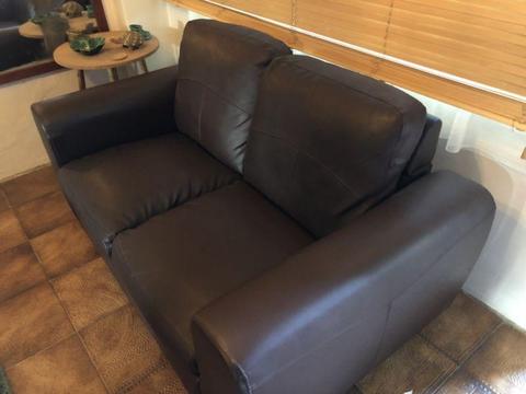 Two seater couch. Synthetic leather