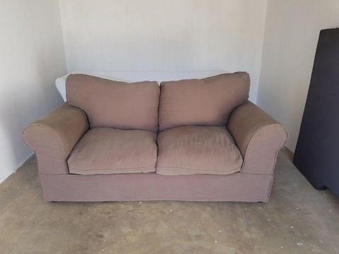 Brown slip cover couch