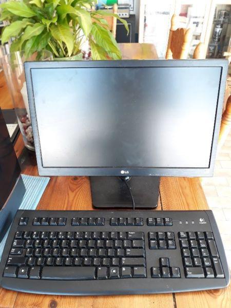 Desktop pc parts including keyboard, monitor and mouse