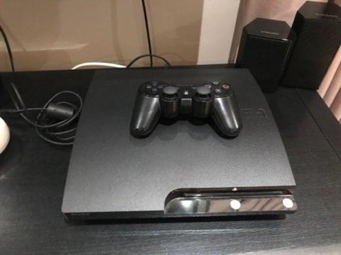 PS3 console with 38 games and controller