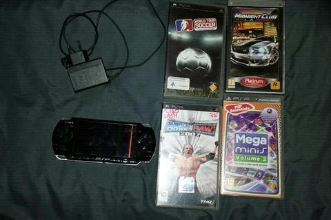 Sony PSP with 4 games ansd memory card