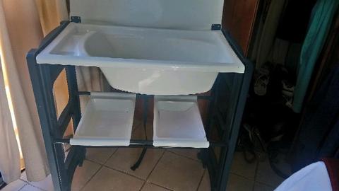 Baby changing table with bath