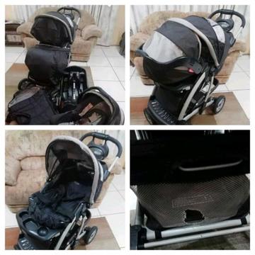 Graco travel system with base, carrycot and windcover