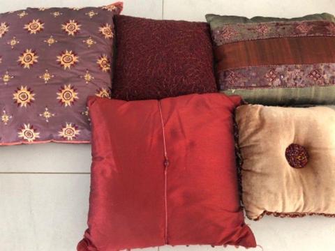 Shades of red scatter cushions