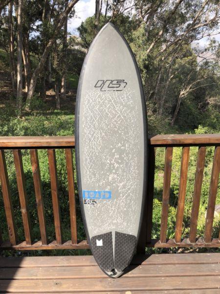 5’10” Hayden shapes surfboard