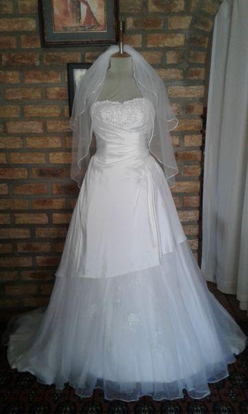 Imported wedding dresses FOR HIRE R1000 including veil petticoat and alterations