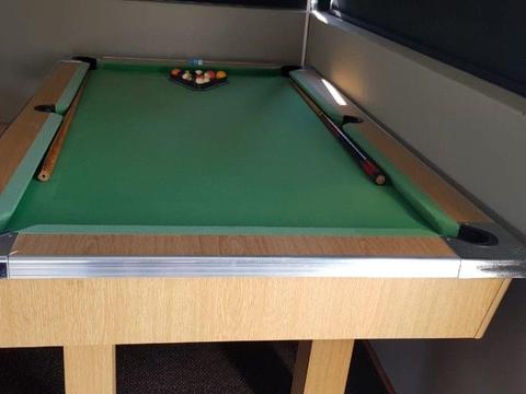 Pool table, good condition. Balls, triangle and 2 cues included