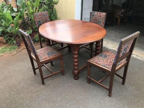 6 seater teakwood dinning room suite with 2 carver chairs