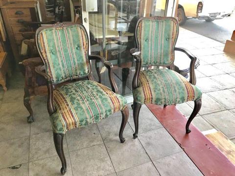 Pair of antique mahogany wood arm chairs