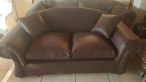 2 seater leather look couch