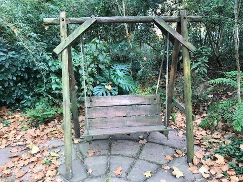Wooden garden swing bench
