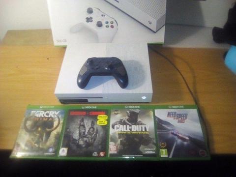 Xbox One S console . comes with 4 games and 1 limited addition controller.all like new R3800