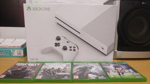 Xbox 1 brand new in box unopened with 4 games