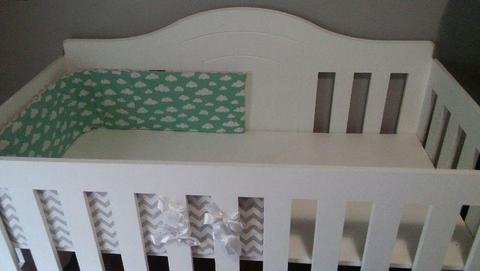 Never been used large cot for sale including a cot bumper from soft spot. R2000
