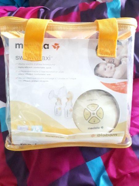 Medela double pump 2 phase swing action
