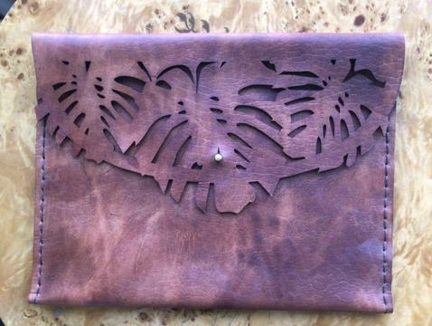 Hand stitched leather Ilundi clutch
