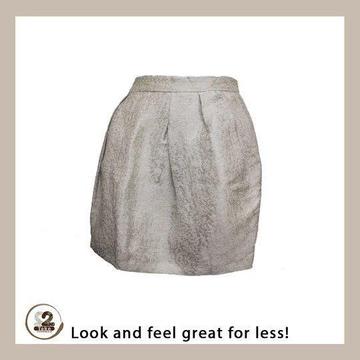 Get this Zara mini skirt and pair it with a warm pair of tights this winter season