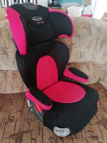 Graco booster seat with cupholders and adjustable headrest