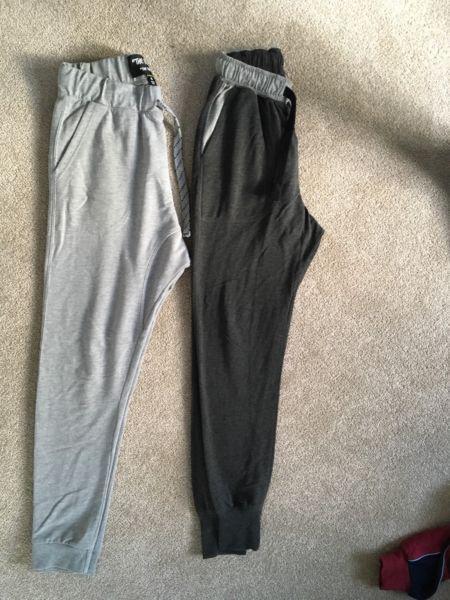 2 pairs of tracksuit pants