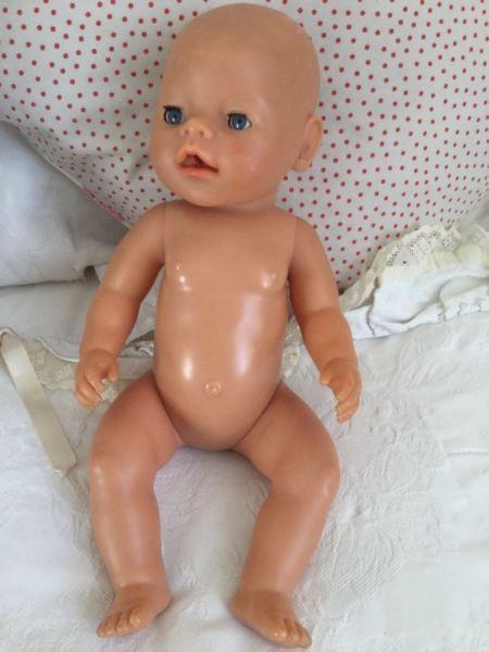 Baby born doll with clothes and accessories