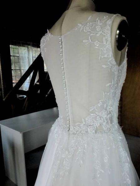 J'adore Designs extraordinary wedding gown