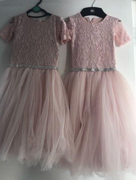 Two flower girl dresses