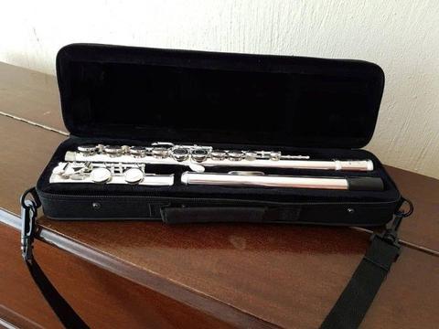Silver Flute for sale. Only a few months old. R2500. With case, etc