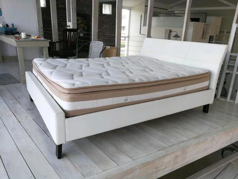 White queen size bed with base