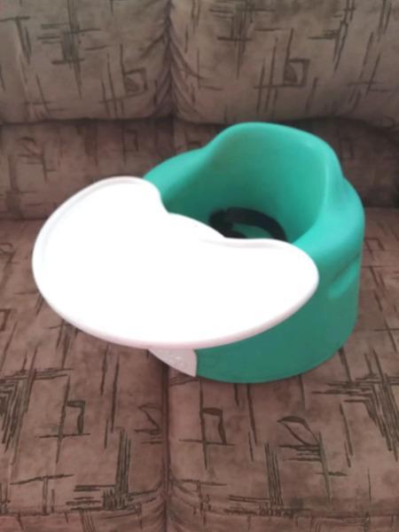 Bumbo seat with tray and harness