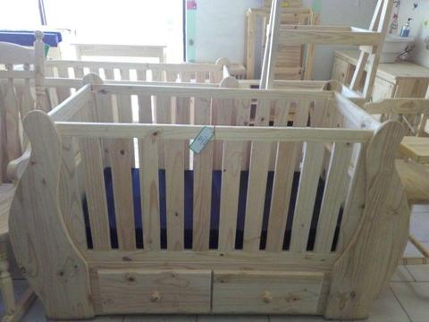 Sleigh cot with drawers